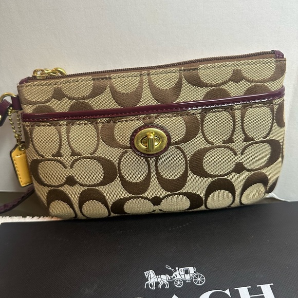 Coach Handbags - Coach Brown and Cream Signature Clutch/wristlet